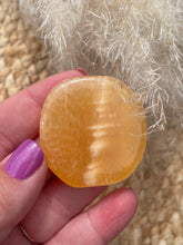 Load image into Gallery viewer, Orange Calcite Smoothie Palm Stone
