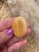 Load image into Gallery viewer, Orange Calcite Smoothie Palm Stone
