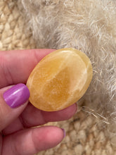Load image into Gallery viewer, Orange Calcite Smoothie Palm Stone
