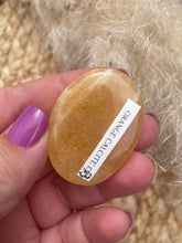 Load image into Gallery viewer, Orange Calcite Smoothie Palm Stone
